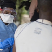 A healthcare worker administering the ebola vaccine